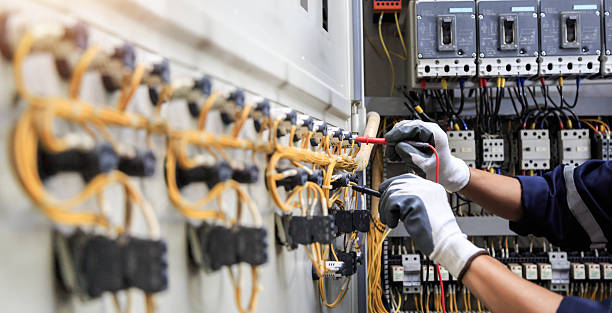 Professional Electrician technician working in Framingham, MA